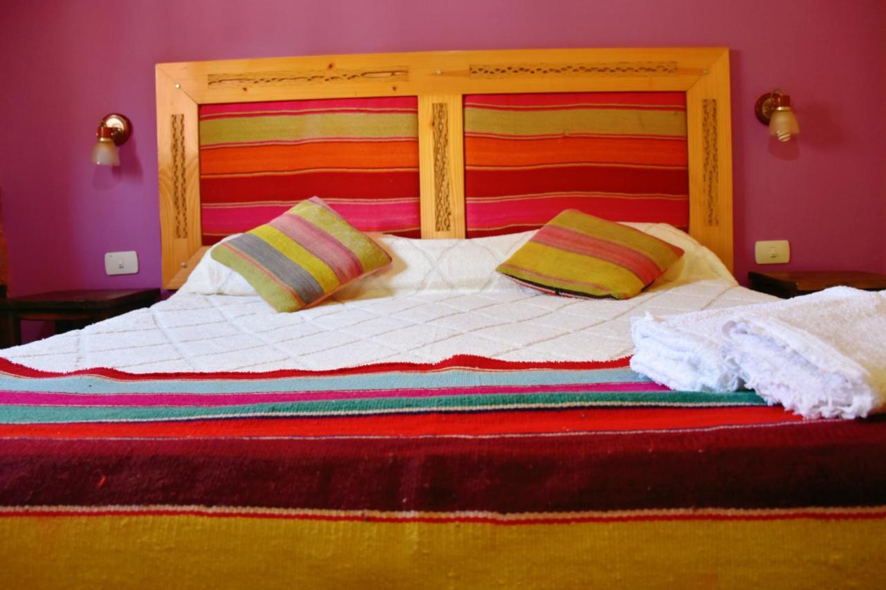 Hostal Paseo De Los Colorados 普尔马马尔卡 外观 照片